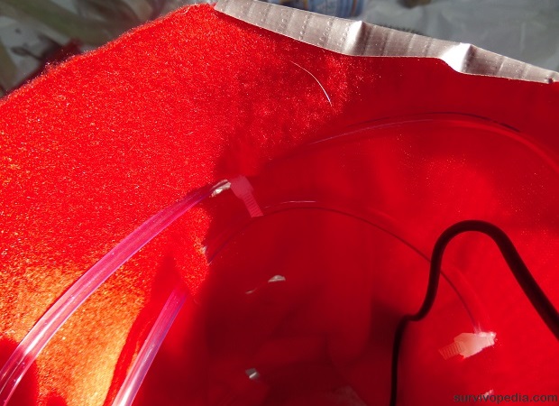 use twist ties to attach fabric to canvas