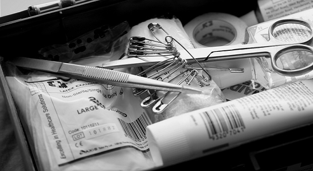 Survival First Aid Kit detail in black and white