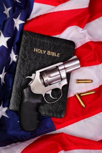 gun and bible on american flag