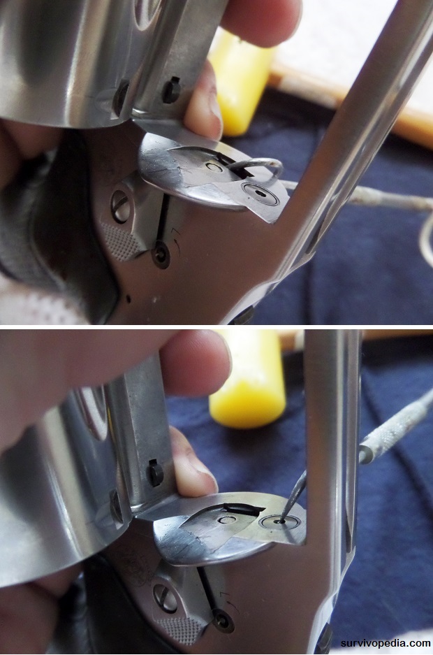 Use small metal picks to clean the lock works of the revolver
