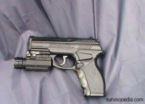 pistol with an attached TAC-Light