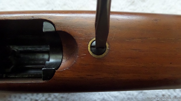 Loosen barrel stock screw.