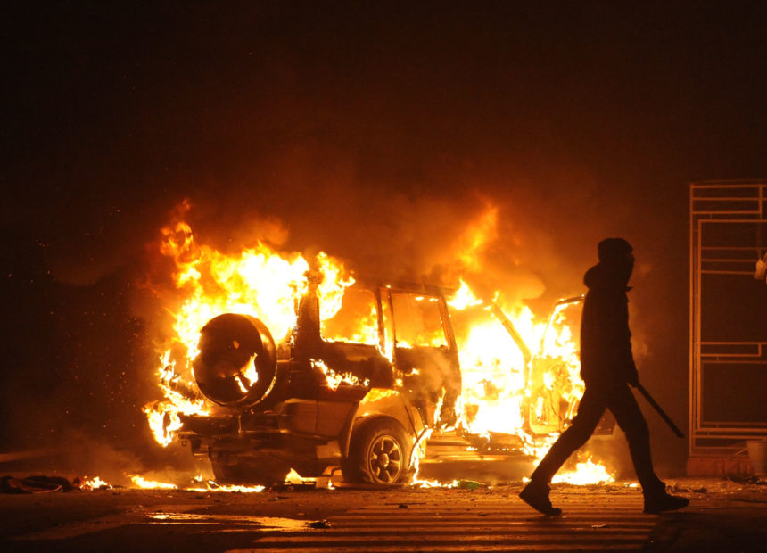 83289047 - burning car, unrest, anti-government, crime