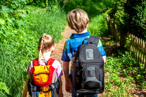 little boy and girl hiking