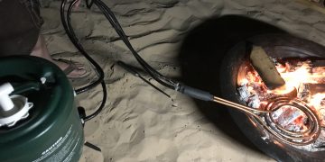 How to Build a Simple Off-Grid Shower in the Backyard